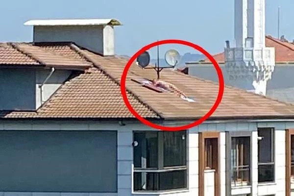Çatıda çıplak adam alarmı! Polis sirenini duyunca kaçtı - Resim : 1