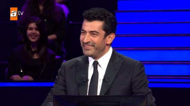 Kim Milyoner Olmak İster'de güldüren anlar! Kenan İmirzalıoğlu'nun koltuğuna oturmaya çalıştı - Resim : 2