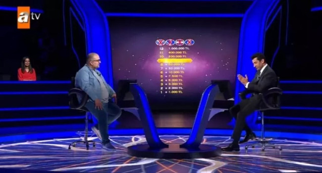 Kim Milyoner Olmak İster'de nefeslerin tutulduğu an! 200 bin TL'lik soruda yaptığı hamle alkış aldı - Resim : 1