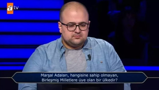 Kim Milyoner Olmak İster'de nefeslerin tutulduğu an! 200 bin TL'lik soruda yaptığı hamle alkış aldı - Resim : 3
