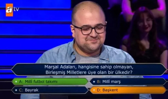 Kim Milyoner Olmak İster'de nefeslerin tutulduğu an! 200 bin TL'lik soruda yaptığı hamle alkış aldı - Resim : 5